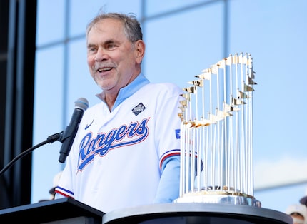 Texas Rangers manager Bruce Bochy speaks to fans during the World Series Victory Parade and...