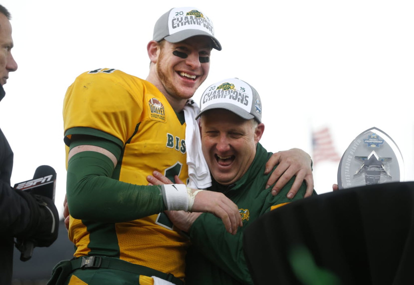 North Dakota State quarterback Carson Wentz holds his jersey after