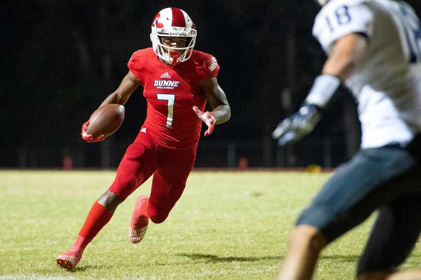 Bishop Dunne senior wide receiver Jabari Khepera (7) turns upfield after making a catch in...