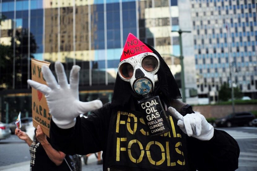 Environmental activists and supporters take part in a demonstration in New York on June 1 to...