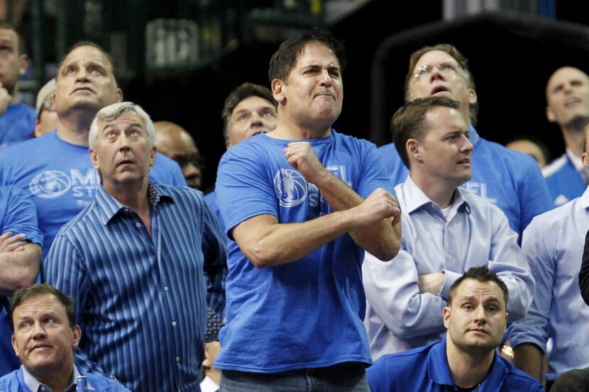 Dallas Mavericks owner Mark Cuban shows his displeasure with a call in a game against the...