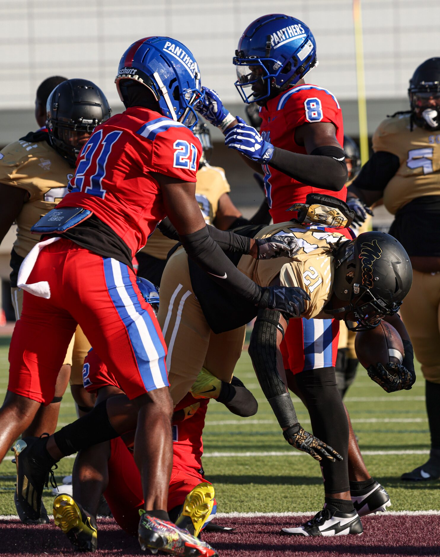 South Oak Cliff High School David Spruiells (21) falls into the end zone to score a...