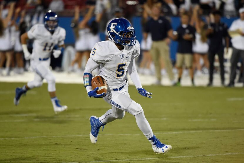 Frisco's Jamal Stanfield runs upfield against Frisco Lone Star during their high school...