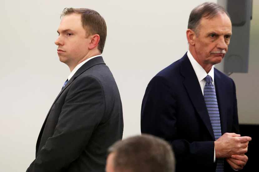 Former Fort Worth Police Officer Aaron Dean, left, stands with defense attorney Bob Gill as...