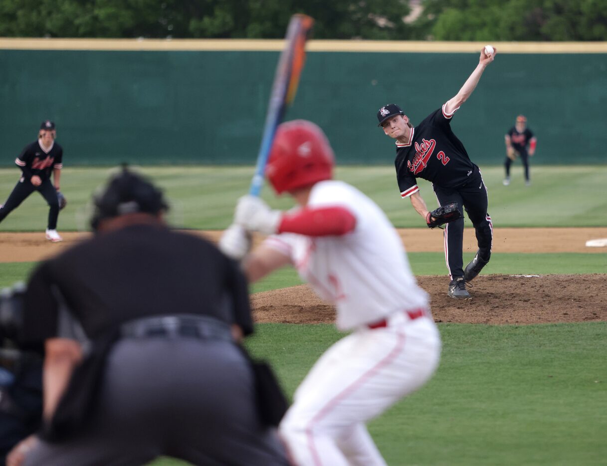 Argyle High School player Alex D'Angelo pitches against Grapevine High School player Jarett...