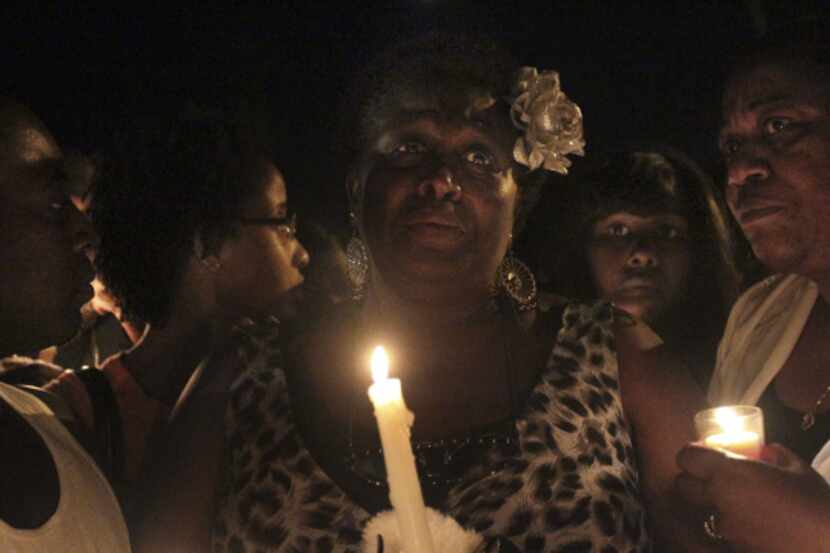 A candlelight vigil for Deanna Cook was held Wednesday on Crimnson Court. Cook's mother,...