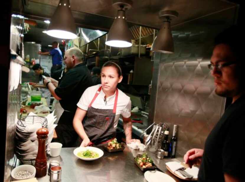 
Kirstyn Brewer expediting in the kitchen at Victor Tangos
