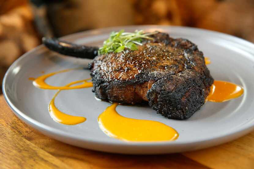 The $45 Campfire Ribeye, a coal charred dry-aged steak, at Jasper's Uptown. 