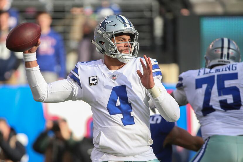 Dallas Cowboys quarterback Dak Prescott (4) makes a pass in the first half of an NFL...