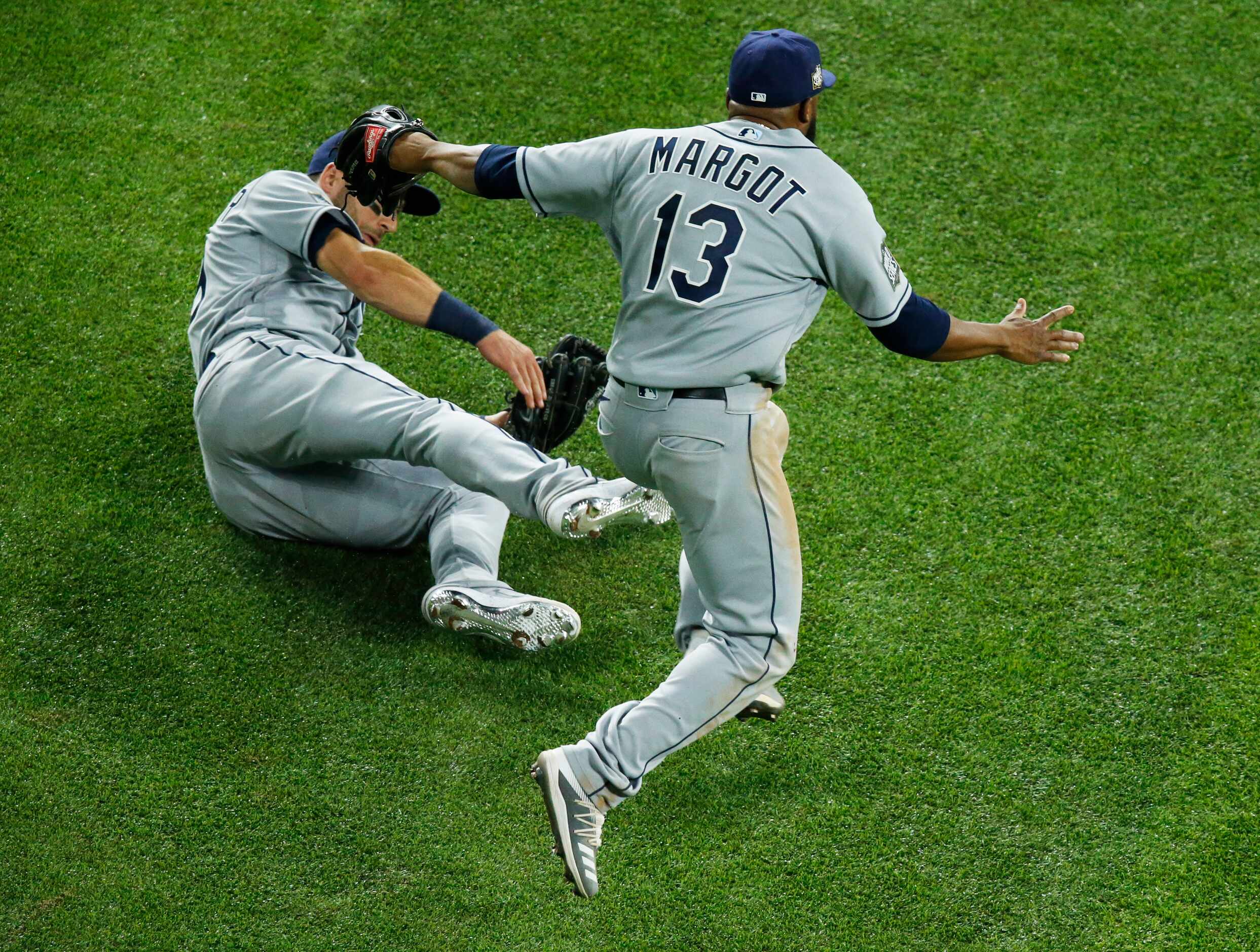 Tampa Bay Rays right fielder Manuel Margot (13) and Tampa Bay Rays center fielder Kevin...