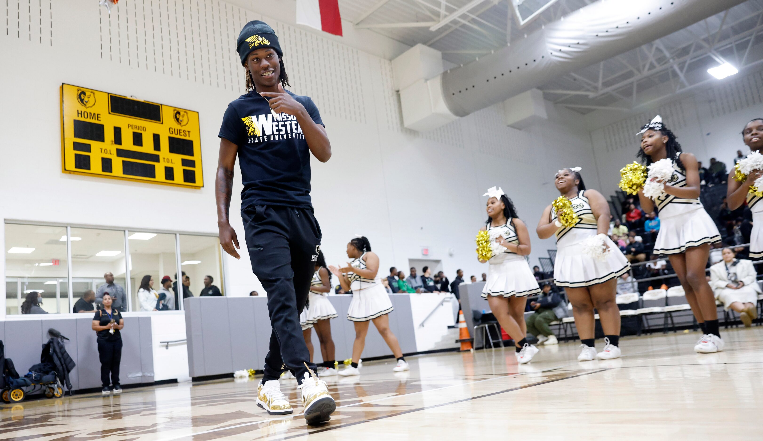 South Oak Cliff football player Daveon Ennis is introduced during the national letter of...