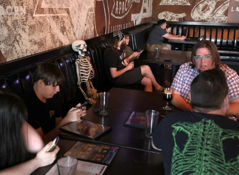 L-R at first tables: Elliot and Max Wiseman, Zachary Presley and Jason Wiseman hang out at...