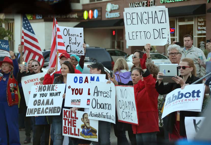 Protestors stood outside as President Barack Obama speaks at Temple Emanu-El.