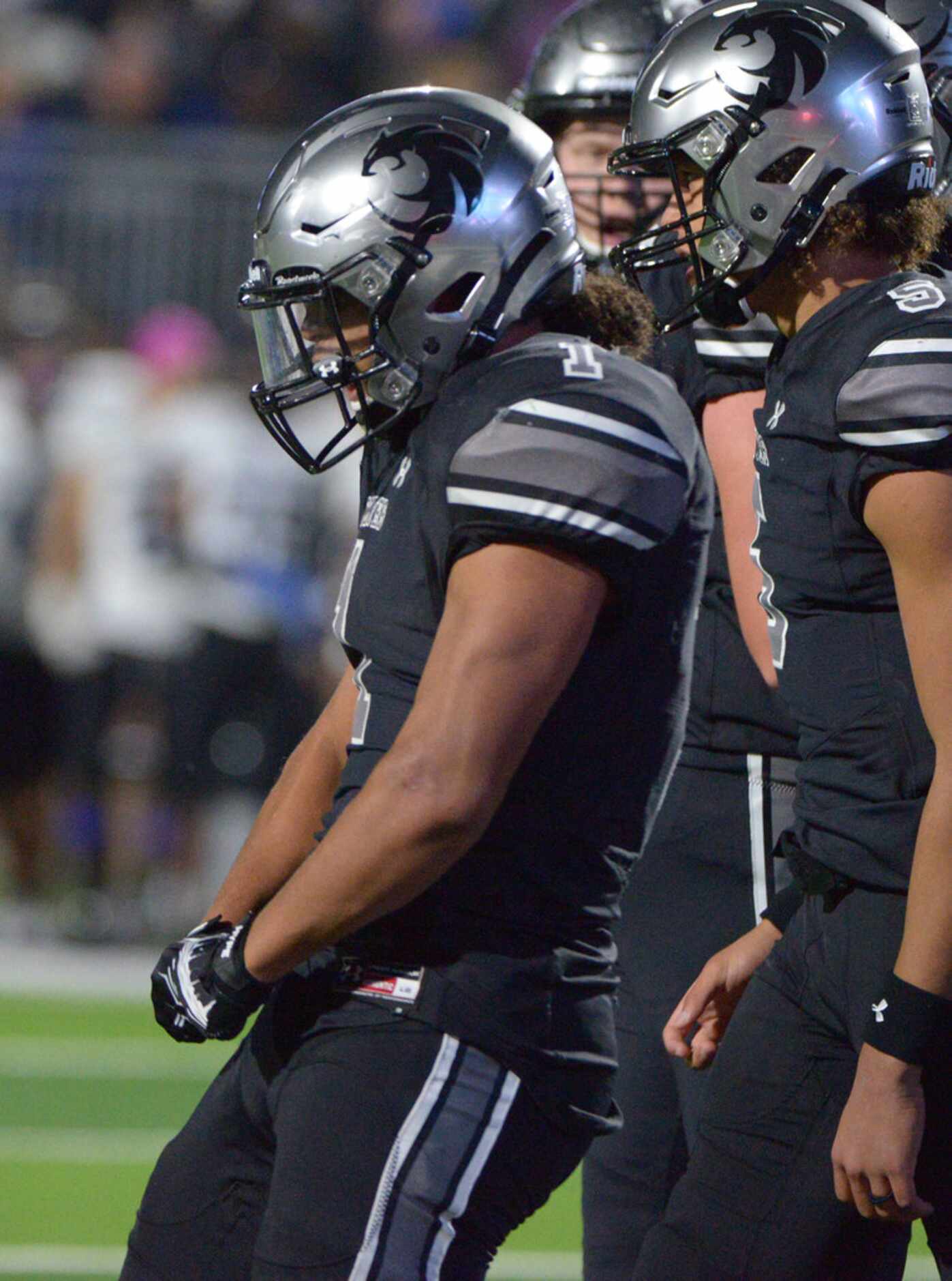 Guyer's Kaedric Cobbs celebrates after a touchdown in the first half of a Class 6A Division...