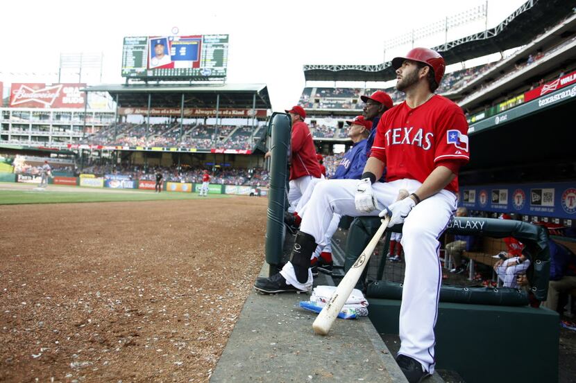 Texas Rangers outfielder Mitch Moreland (18) waits to be up at bat during the 9th inning of...