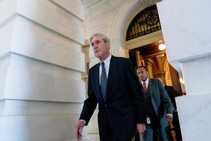 Special Counsel Robert Mueller departs Capitol Hill after a closed-door meeting in...