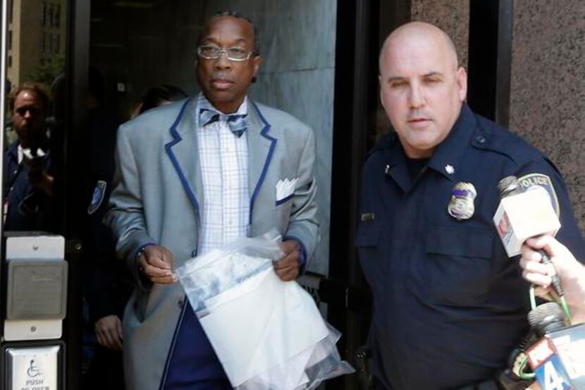 
Dallas County Commissioner John Wiley Price left the federal courthouse Friday in Dallas....