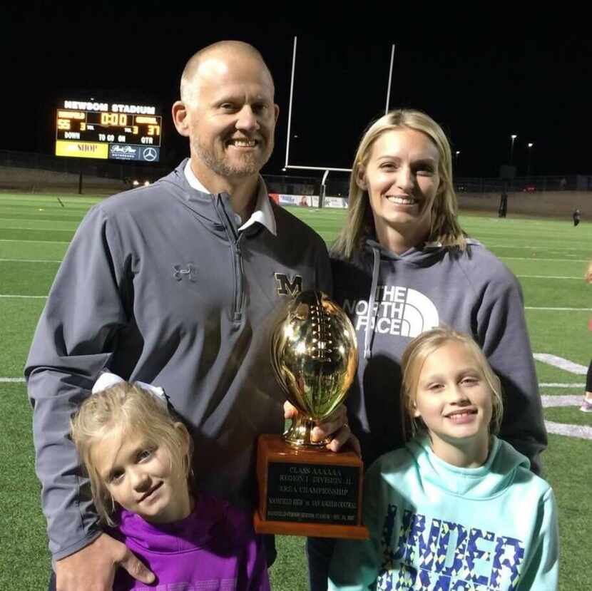 Mansfield football coach Daniel Maberry with his wife, Cami, and their two daughters. 