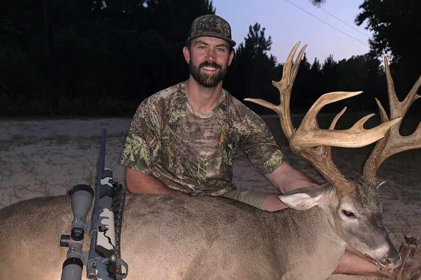 Joel Colston displays the remarkable 4 1/2-year-old free-ranging buck he took Oct. 9 while...