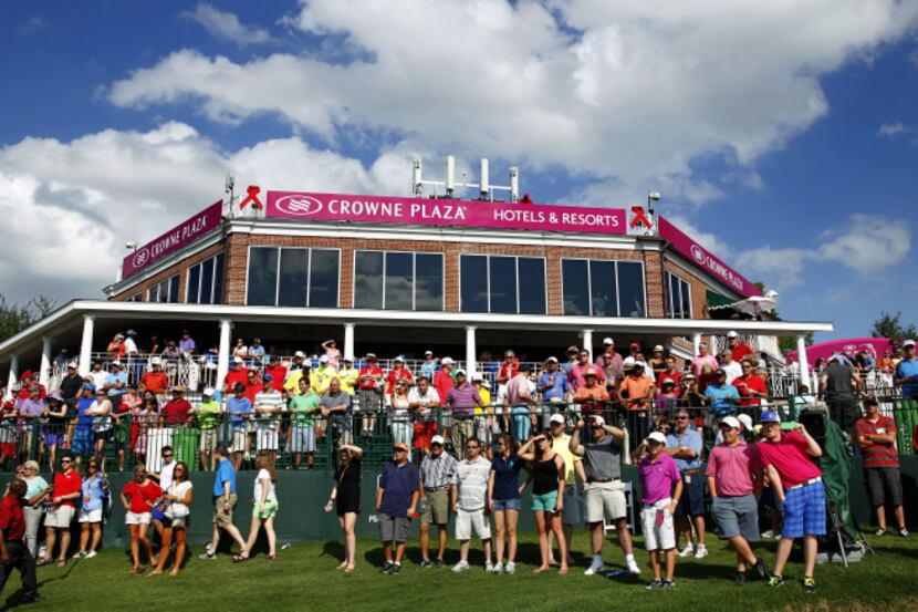 Fans watch the trophy presentation after PGA Tour golfer Boo Weekley won the Crowne Plaza...