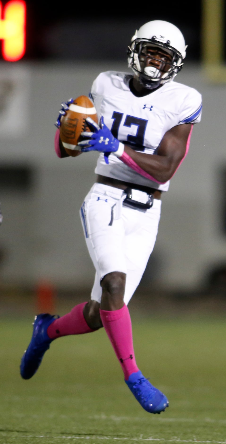 Trinity Christian Cedar Hill receiver Jordyn Williams (13) pulls in a reception during...