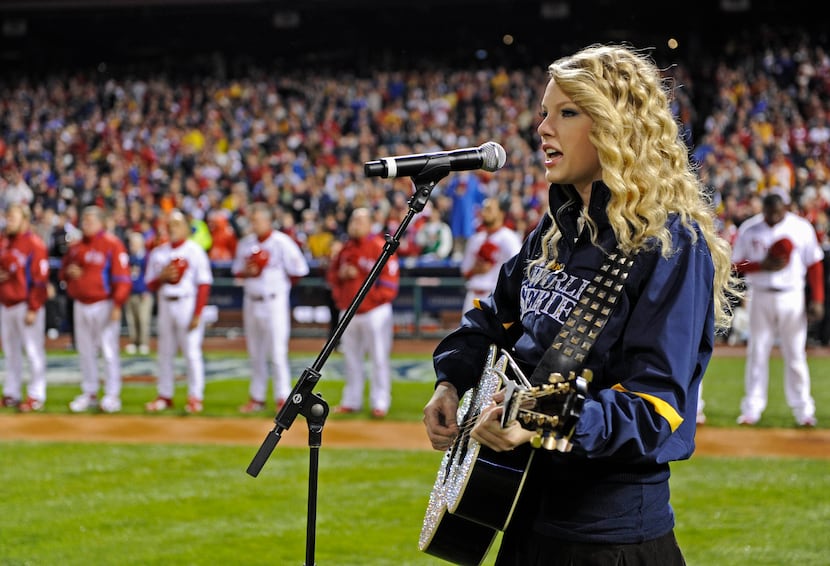 FILE - Singer Taylor Swift performs before Game 3 of the baseball World Series between the...