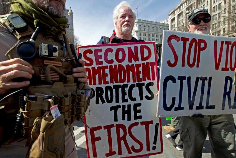 Pro-gun demonstrators protest during the "March for Our Lives" rally in support of gun...