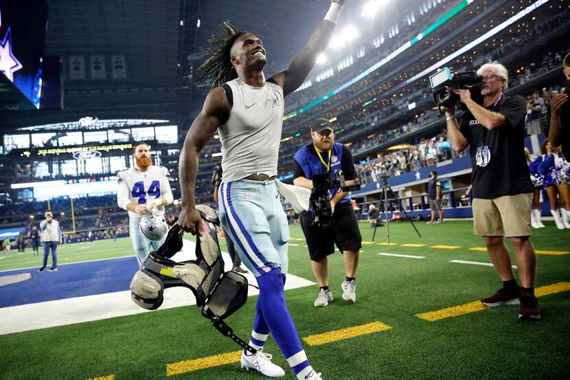 Dallas Cowboys wide receiver CeeDee Lamb (88) celebrates their win over the New York Giants...