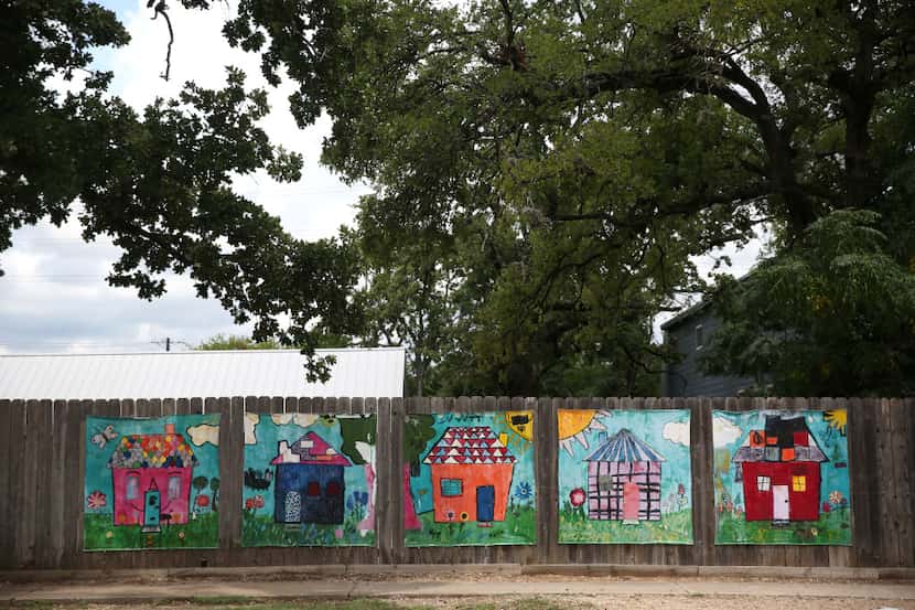 Homes painted by children at Helping Hand Home, a residential foster care facility for...