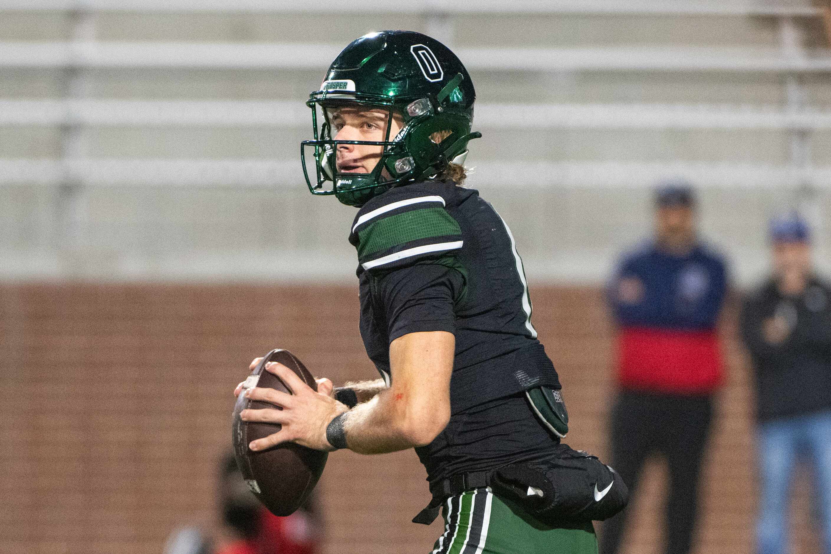 Prosper's quarterback Nathan TenBarge (0) looks to pass in the second half during a high...