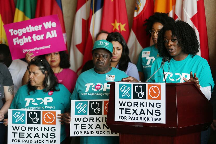 Shetamia Taylor, a member of the Texas Organizing Projects, speaks during a press conference...