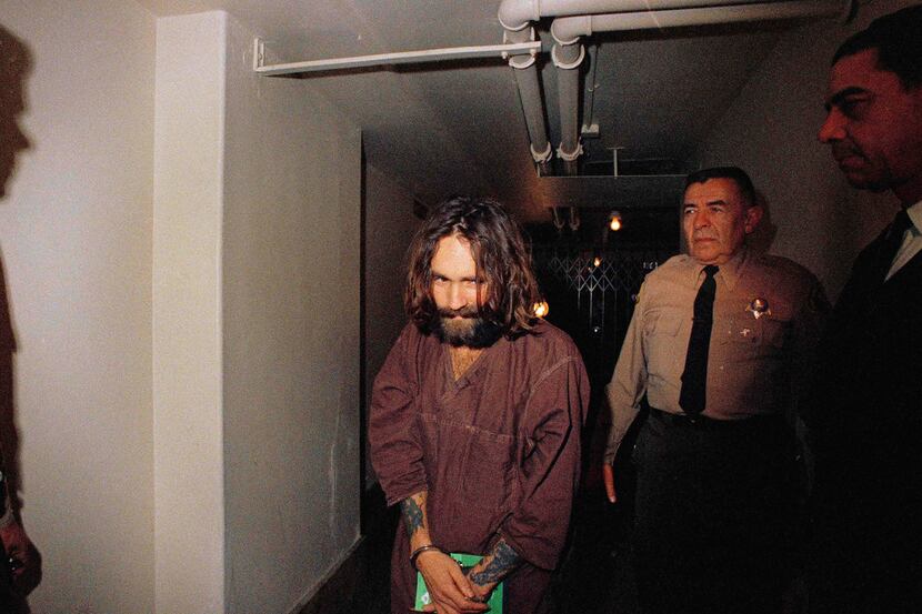 In this 1969 file photo, Charles Manson is escorted to court in Los Angeles during an...