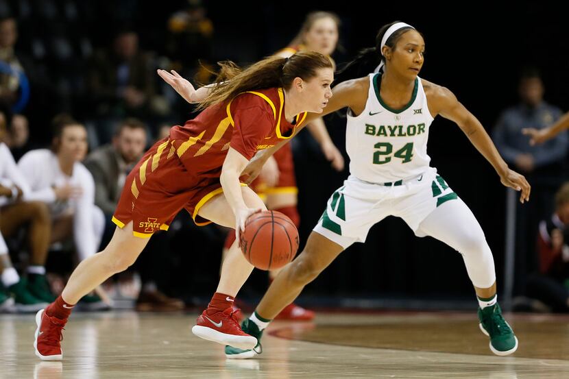 Iowa State guard Alexa Middleton, left, drives to the basket around Baylor guard Chloe...