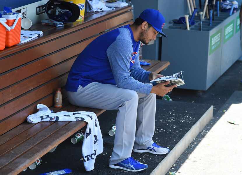 LOS ANGELES, CA - JUNE 28:  Yu Darvish #11 of the Chicago Cubs looks over the team media...