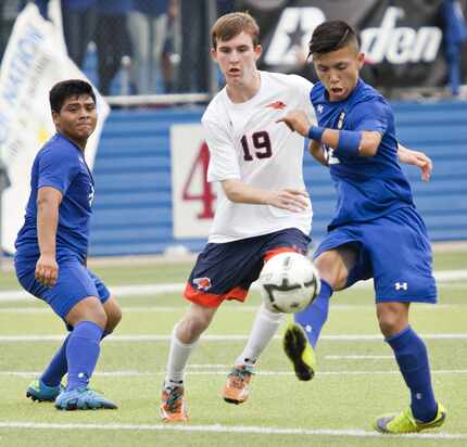 FILE - Frisco Wakeland player Matt Ribble (19) is met with Brownsville Porter player Daniel...