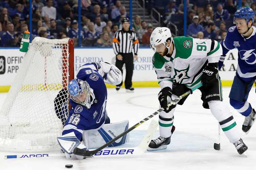 Tampa Bay Lightning goalie Andrei Vasilevskiy, (88), of Russia, makes a save on a shot by...