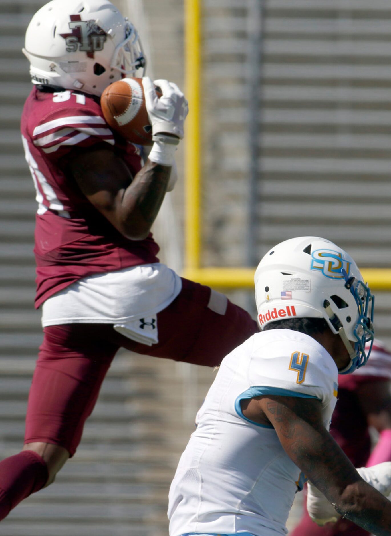 Texas Southern defensive back Byron Edwards (31) skies to intercept a first quarter pass...