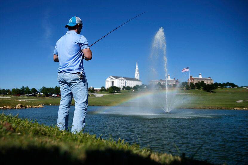 College student Christian Sanford took advantage of the nice weather to fish for bass in the...