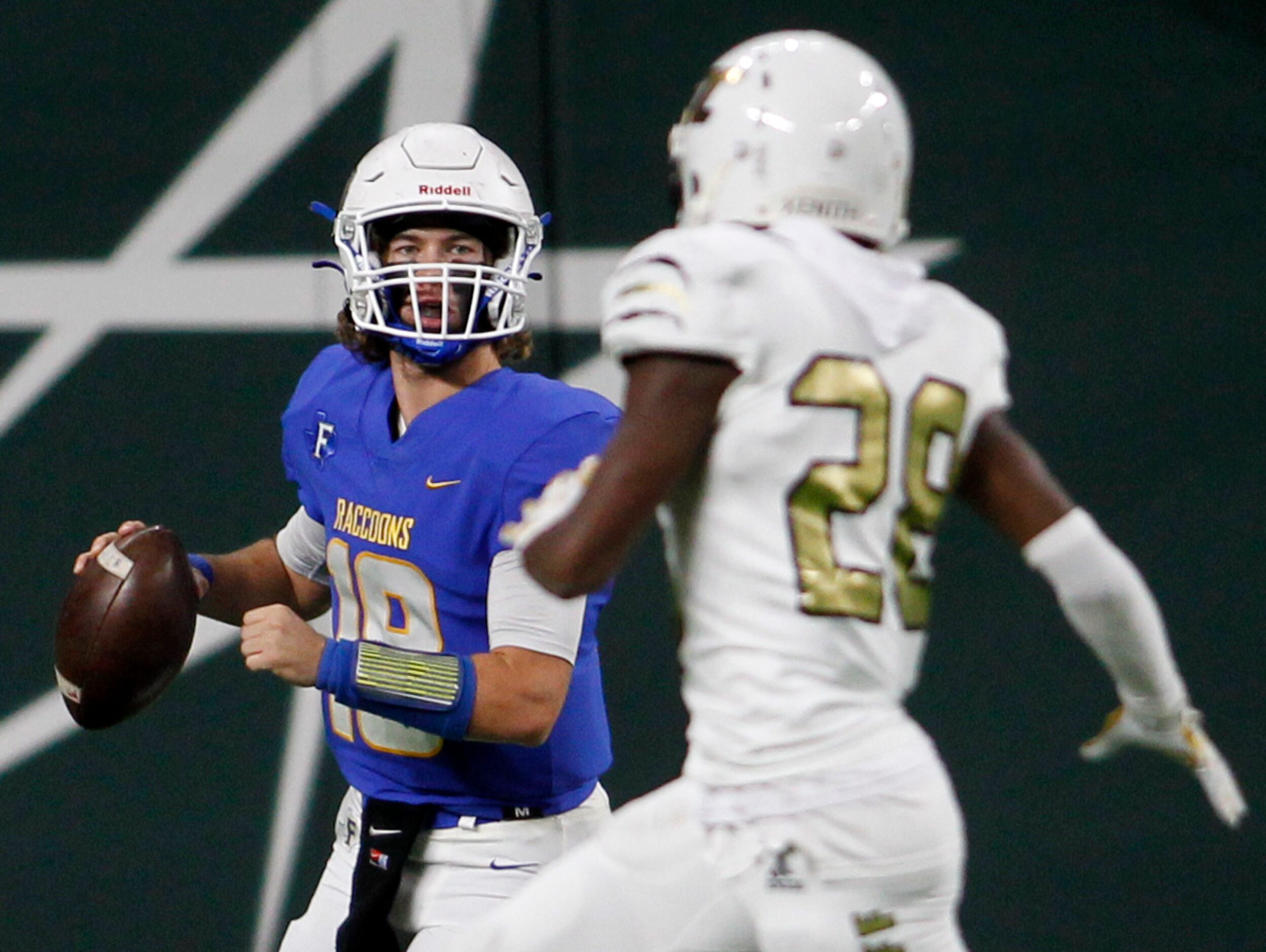 Frisco quarterback Wyatt Carson (18) looks for a receiver downfield as South Oak Cliff...