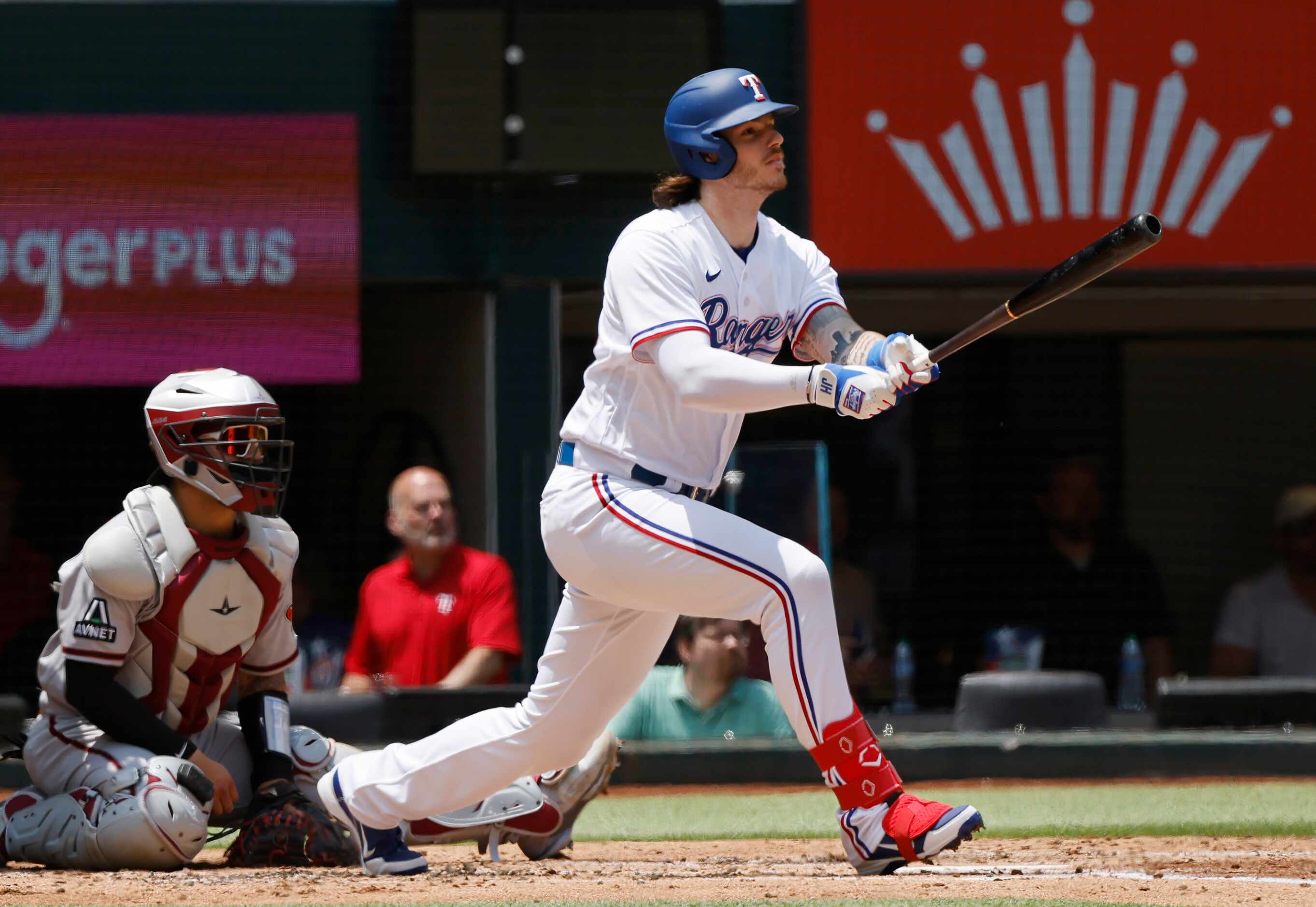 Texas Rangers designed hitter Jonah Heim (28) watches his second inning solo home run...