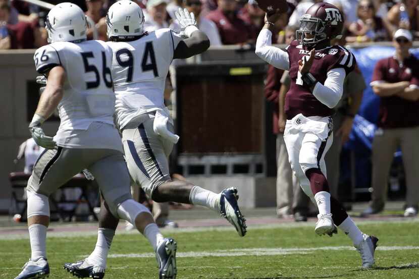 Texas A&M quarterback Kyler Murray (1) throws a pass against Nevada during the second half...