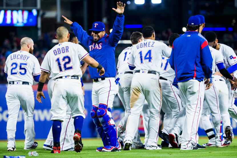 The Texas Rangers celebrate a 2-1 win after an MLB game between the Texas Rangers and the...