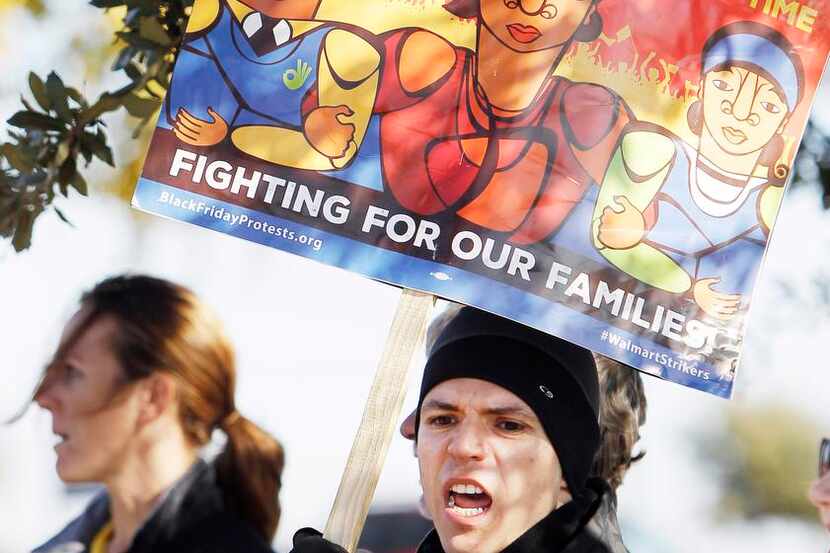 
Our Walmart protester Angel Gallardo walked a picket line for higher wages outside a...