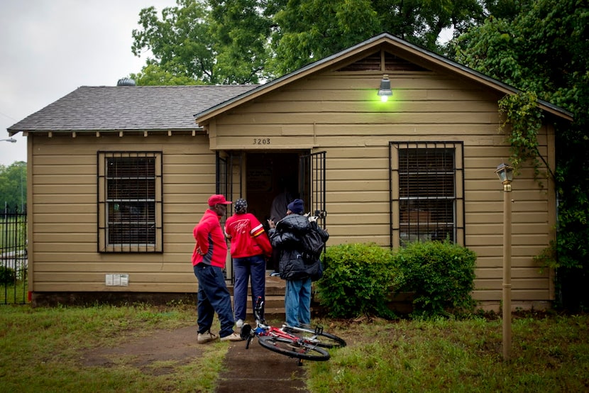  Customers waited outside the S.M. Wright Foundation Clothing and Resource Center on...