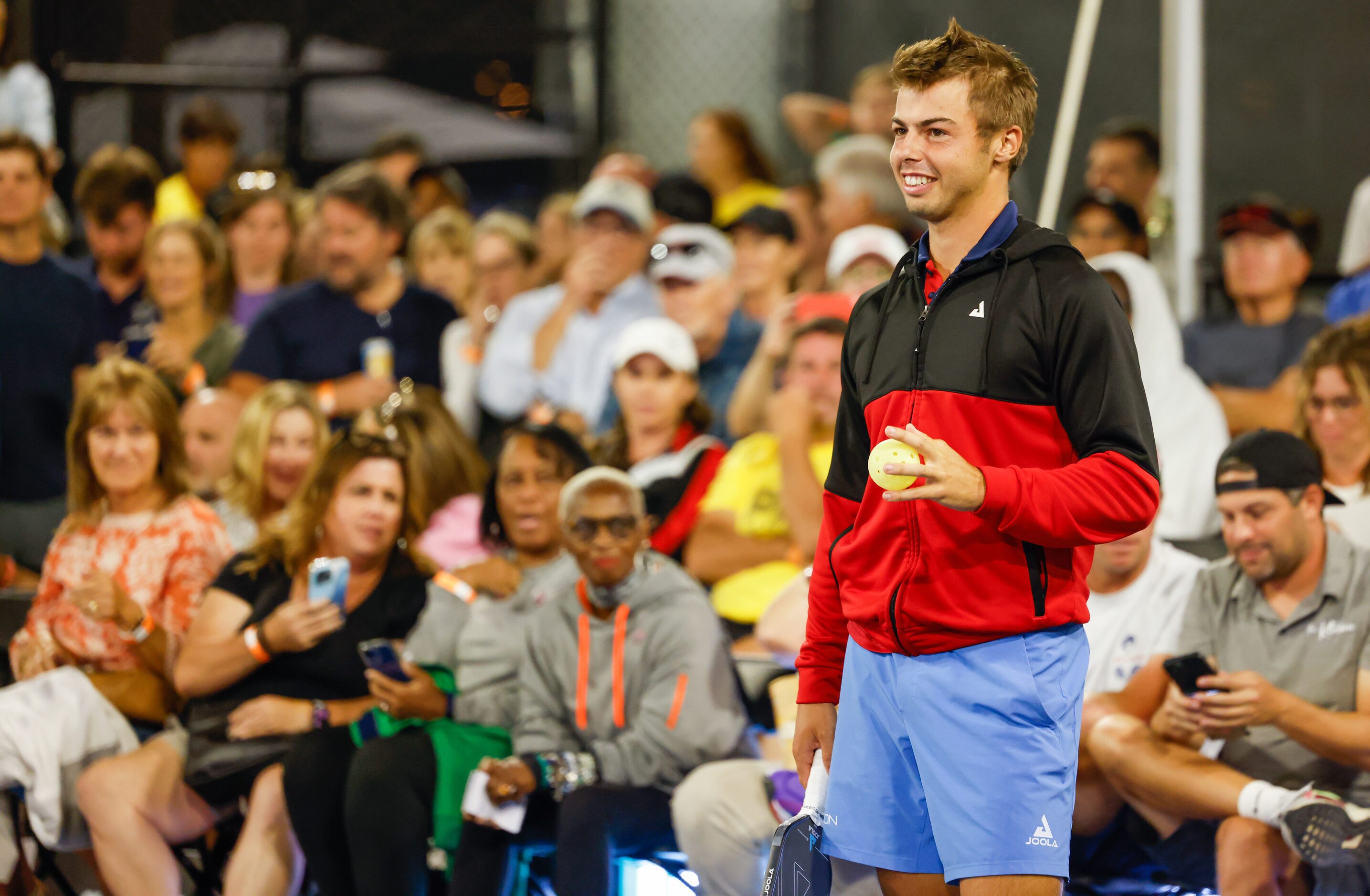 Ben Johns prepares to start a doubles match of pickleball with Scottie Scheffler in the...