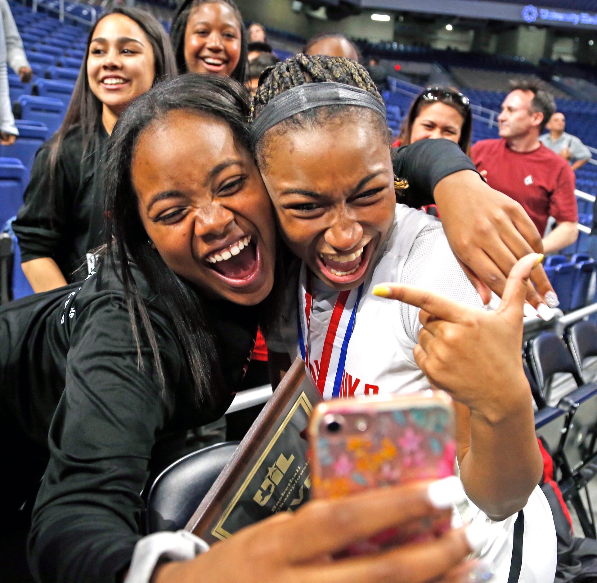 Frisco Liberty guard Jazzy Owens-Barnet #30 has a selfie taken with best friend Kyrie Crear....