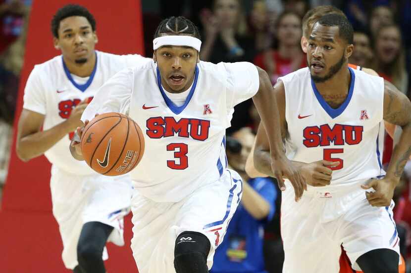 SMU guard Sterling Brown (3) runs up court in the first half during an NCAA season-opening...