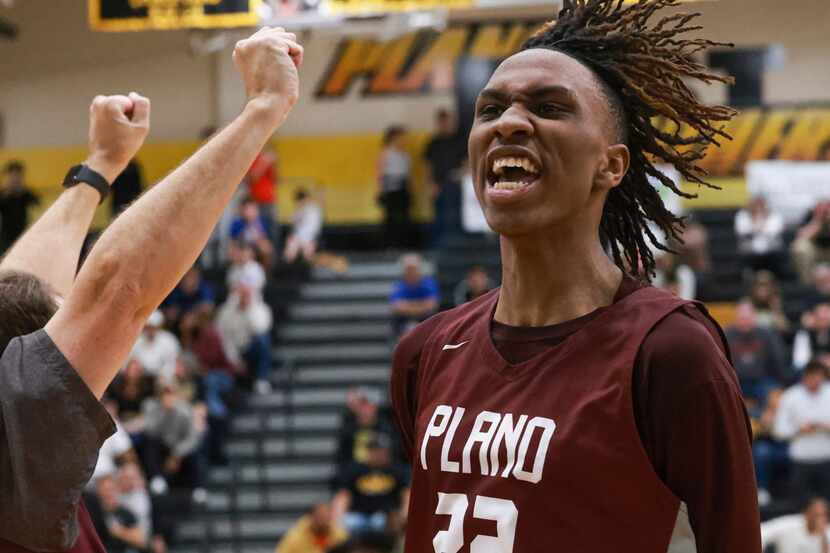 Plano Senior High School’s Nikk Williams (22) turns to the crowd cheering after Justin...