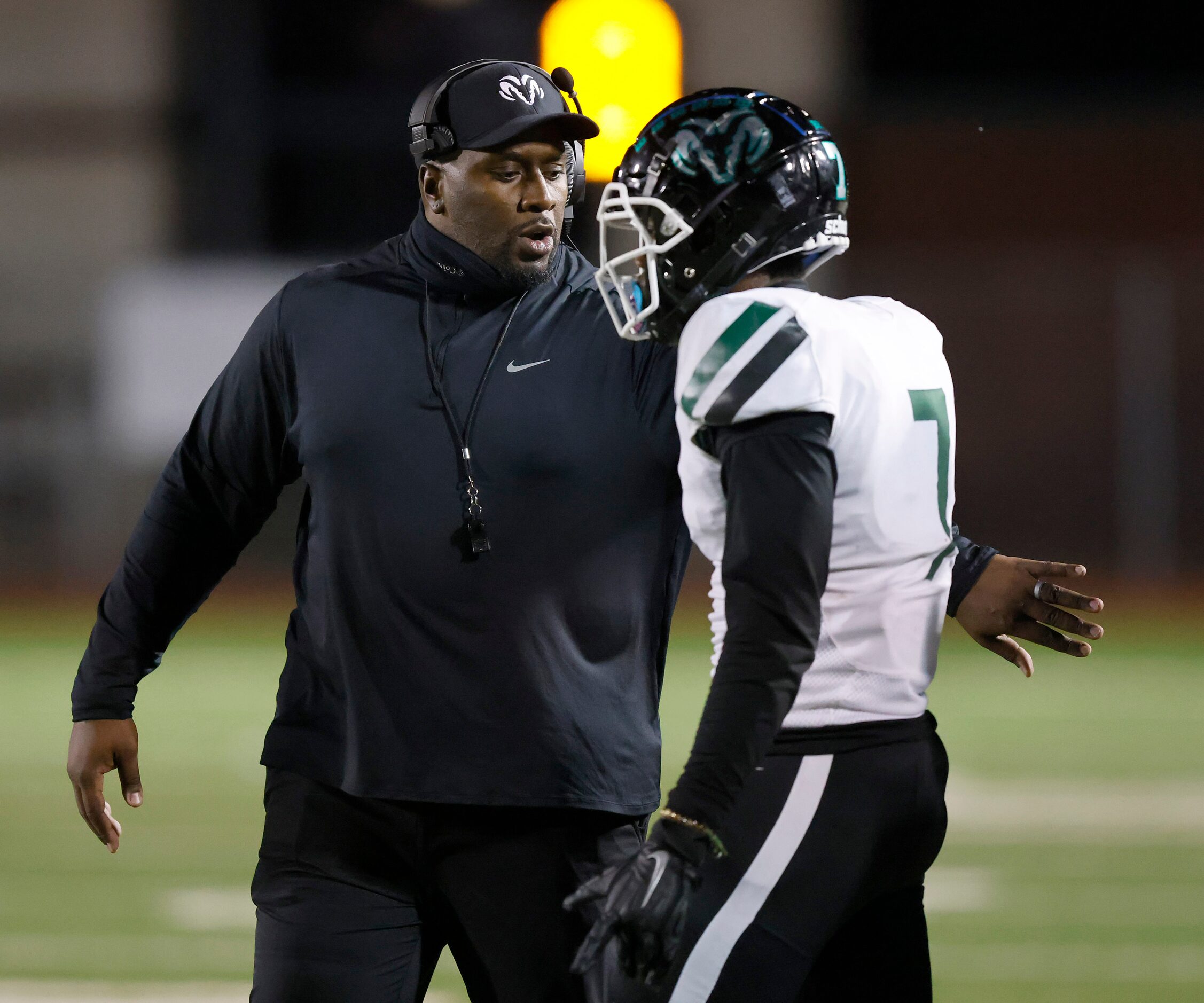 Richardson Berkner head football coach Trey Bryant congratulates Lemone Stewart (7) omg...