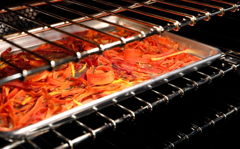 Carrot peels turn crisp when baked in the oven at 350 F.